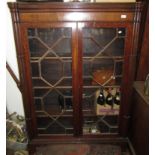 A mahogany glazed bookcase, 19th century,