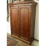 A late Victorian mahogany gentleman's wardrobe,