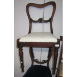 Four single Victorian mahogany dining chairs and an Edwardian inlaid mahogany side chair.