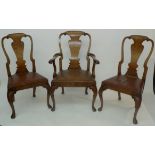 A good set of eight George I style walnut dining chairs,