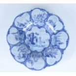 A Delft blue and white moulded bowl, in 17th century style.