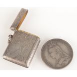 An engine turned and engraved silver vesta case, together with a Victorian silver crown 1888.