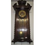 A Gustav Becker mahogany Vienna type wall clock, circa 1900, height 107cm, width 48cm.