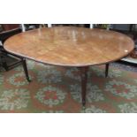 A George III mahogany extending dining table,