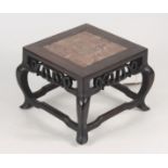 A Chinese huali wood stand, early 20th century, with square marble inset top,