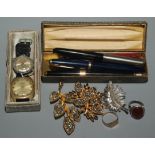 A 9ct gold signet ring 3.4g, a silver ring, pens, watches and three costume brooches.