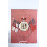 A mariner's needlework panel 'Malta Present' above a crown and a photograph of an officer within a