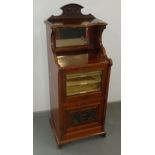 An Edwardian mahogany music cabinet, height 113cm, width 46.5cm.