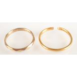 A 22ct gold band, 2.3g and a 9ct gold band, 1.5g.