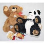 One Steiff brown teddy bear and one Steiff panda bear,