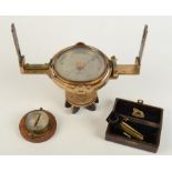 A brass surveyor's dial made by J Casartelli & Son, Manchester,