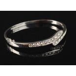 A good 18ct white gold Chinese hinged bracelet by Chow Sang Sang,