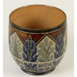 A Doulton Lambeth pottery jardiniere, the body decorated with leaves,