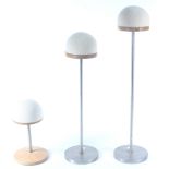 Three hat stands, heights 64.5cm, 54.5cm and 26.5cm.