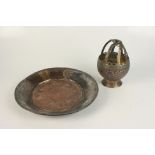 A Persian incense burner, height 20cm and a copper dish, diameter 34cm.