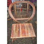 A rustic garden chair and matching table.