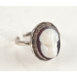 A silver ring set with a Roman cameo portrait.