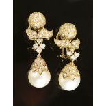 A pair of elegant, post-war, diamond set,