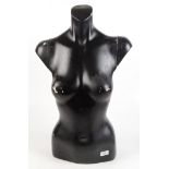 A black female mannequin, height 66cm, width 41cm.