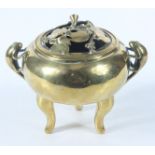 A Chinese brass censer and cover, circa 1900, the circular body with three rat like creatures,