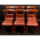 A set of six early Victorian mahogany dining chairs, with wide crest rails and drop in seat.