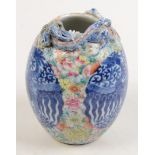 A Chinese ovoid vase with dragon in high relief around the mouth,