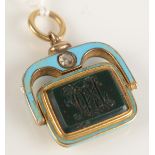 A good 19th century French gold, blue enamel, diamond set, swivel fob with bloodstone panels.