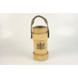 A leather cylindrical fire bucket, early 20th century, with a coat of arms, height 32cm,