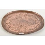 An Arts and Crafts oval copper tray, repousse decorated with stylised fish and shells, 33 x 42cm.
