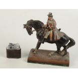 An Austrian painted spelter table lighter modelled as a highwayman, height 23cm,