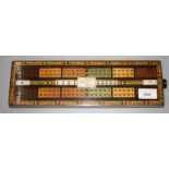 A Masonic parquetry inlaid cribbage board, 33 x 10cm.