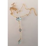 A Belle Epoque gold turquoise and pearl necklace, retailer's box of Stewart Dawson & Company,