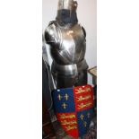 A suit of armour, comprising a nasal helmet with chainmail neckpiece, a cuirass, pauldrons,