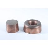 A pair of copper jelly moulds, height 5.5cm, diameter 13.5cm and height 6.5cm, diameter 9cm.