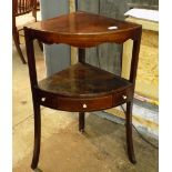 A George III mahogany corner washstand, height 81cm.