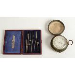 A pocket barometer in brass housing and leather case,