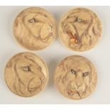 A set of four oriental ivory, lion carved buttons, diameter 30mm.