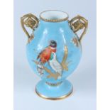 A Victorian porcelain twin handled blue ground vase,