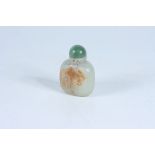 A mutton fat with russet jade snuff bottle, 18th/19th century, height 4.9cm.