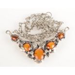 A Cornish Stone Company Arts and Crafts silver and amber necklace.