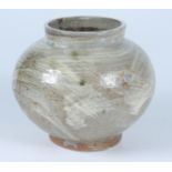 A Bill Marshall stoneware globular vase, brushed with Hakeme with hints of green, impressed seal,