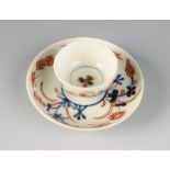 An 18th century English porcelain miniature tea bowl and saucer,