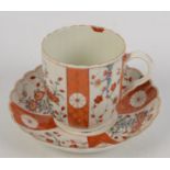 An 18th century Worcester teacup and saucer, decorated 'Scarlet Japan' pattern, height of cup 8cm,
