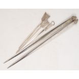 A pair of large meat skewers with ram's heads finials,