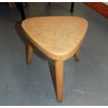 A Robin Nance three legged stool.