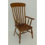 A Victorian lath back Windsor armchair, stamped R.H. to the back of the seat.