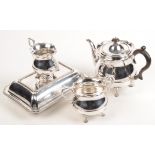 An EPNS three piece tea service on shell capped legs,