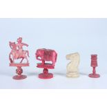 Three Indian red stained ivory chess pieces, circa 1900, heights 8cm, 5.5cm and 4.