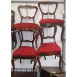 A set of four Victorian rosewood dining chairs,