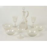 A Venetian glass decanter, four bowls and three glasses, decanter height 27cm.